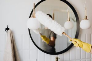 dusting mirror in house