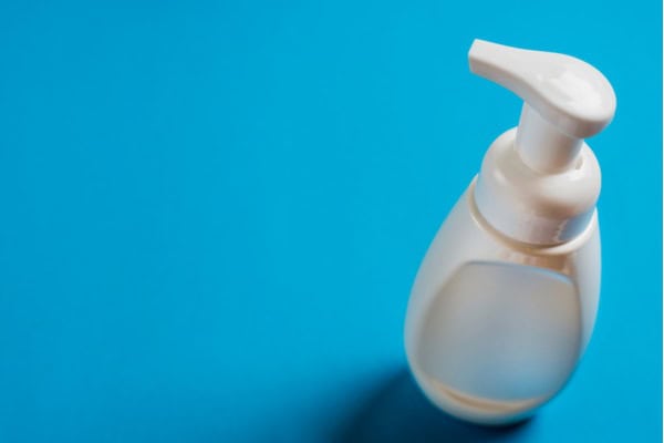mild soap solution on a blue background